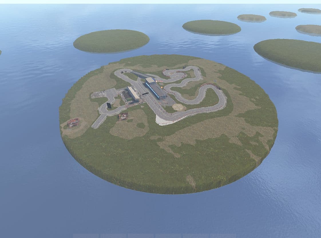 A kart racetrack island with a floodlit pit lane and cone-lined corners